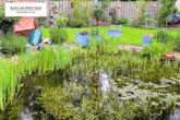 Gartenansicht mit Teich - Stilvoll modernisiertes Einfamilienhaus in bester Lage von Rodenkirchen